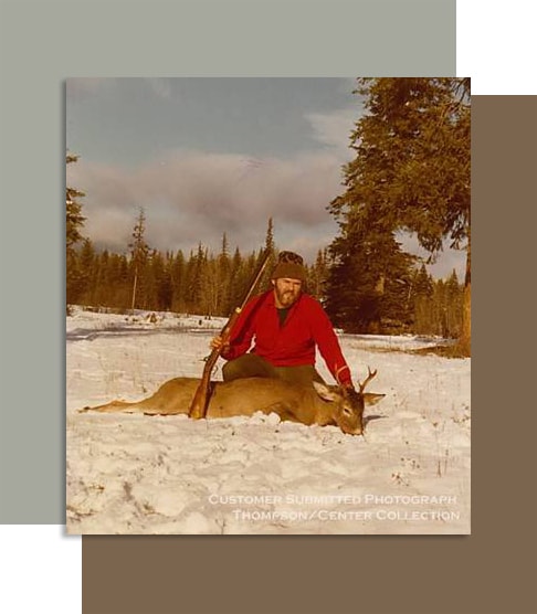Thompson Center Rifle Hunter with Deer