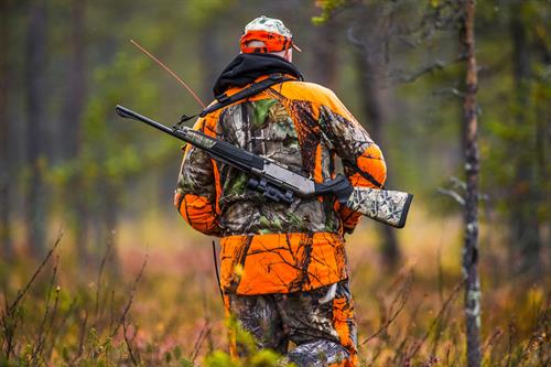 hunter in fall hunting season-min