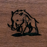 ENGRAVED BOAR HEAD WITH TUSKS