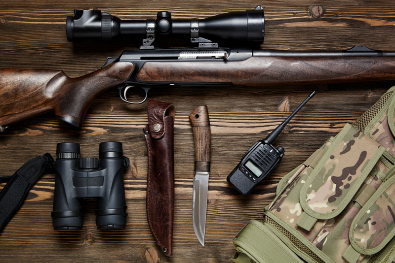 Hunting gear on wood table